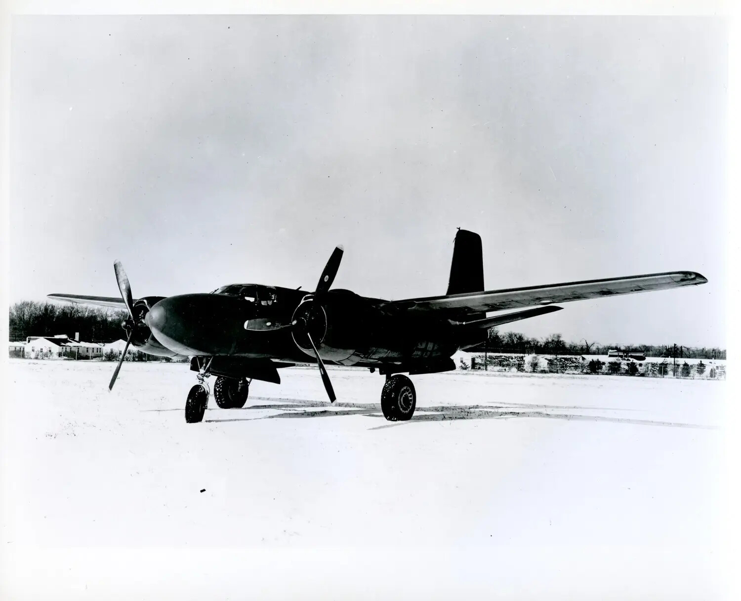 Douglas A-26 Invader Attack Bomber on Snow-Covered Airfield Ramp