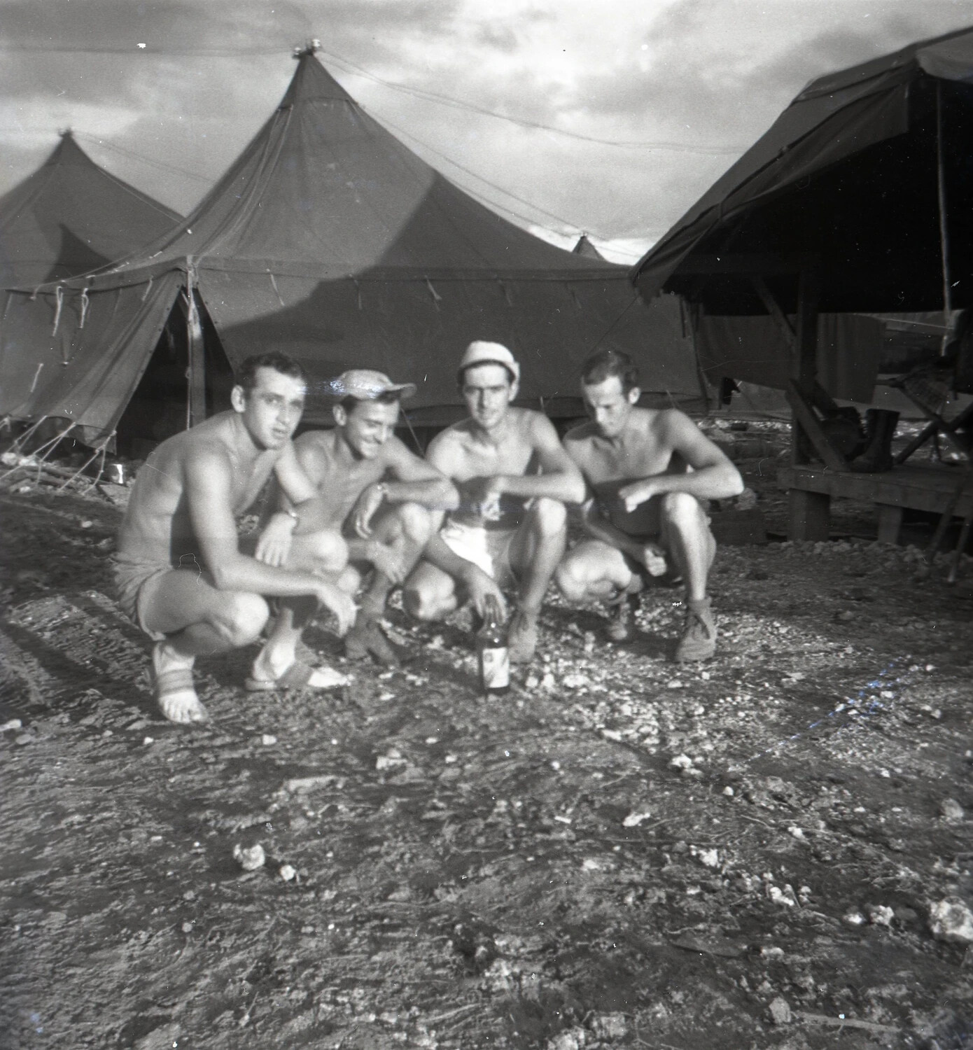 Four Servicemen Posing Off-Duty Before Squad Tents, 345th Bombardment Group Encampment, Pacific Theater, WWII