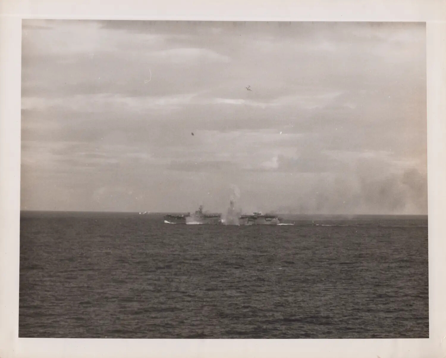 Escort Carriers Under Air Attack, Bomb Splash Near Formation, 25 October 1944
