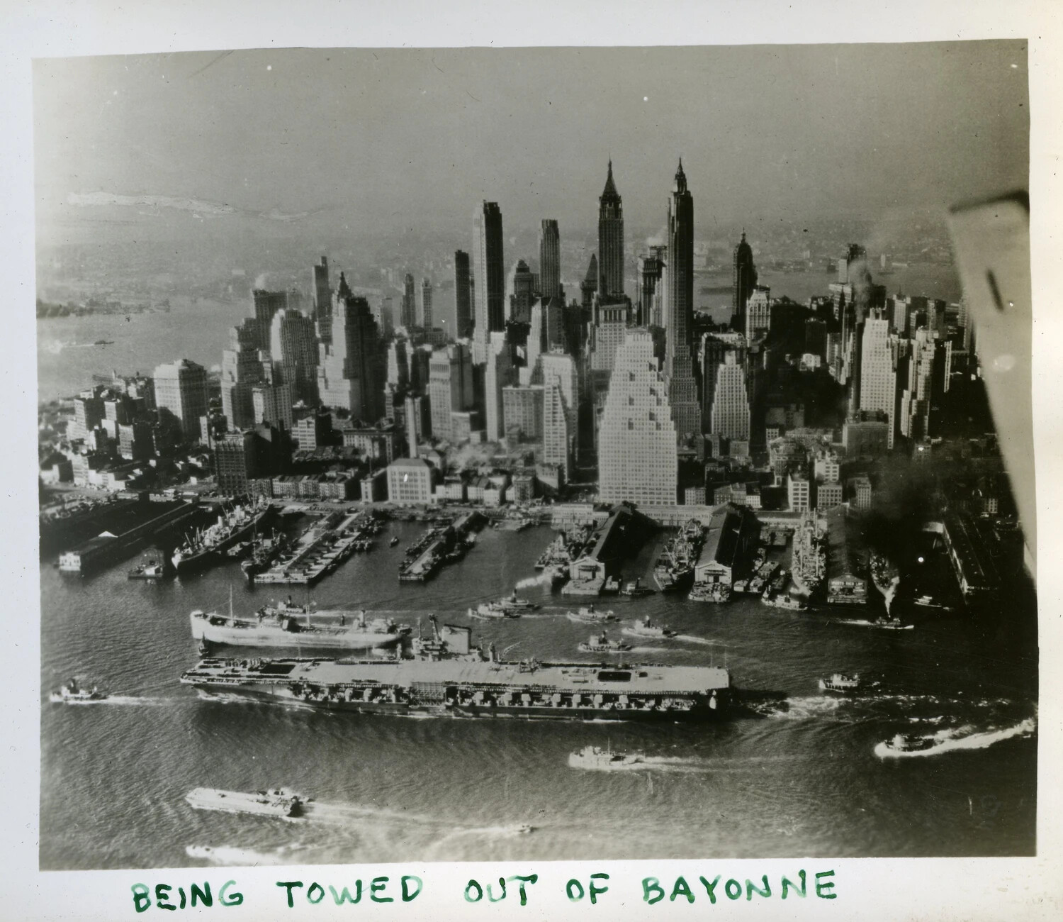 USS Franklin D. Roosevelt (CVB-42) Under Tow Through New York Harbor, 'Being Towed Out of Bayonne'