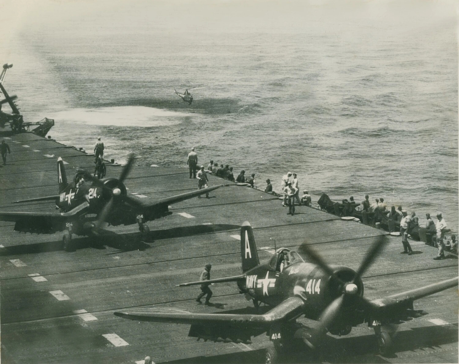 F4U Corsair Fighters on Carrier Flight Deck with Plane-Guard Helicopter