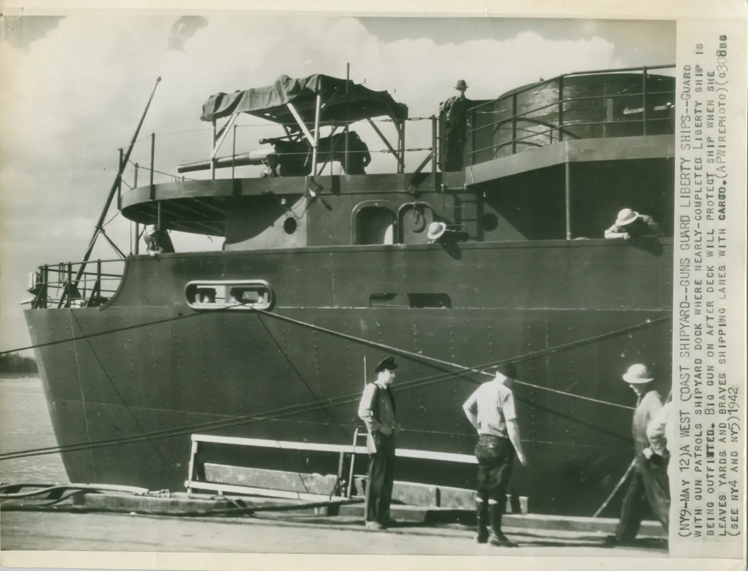 Stern Gun Platform of Nearly-Completed Liberty Ship Under Guard at West Coast Shipyard, May 1942