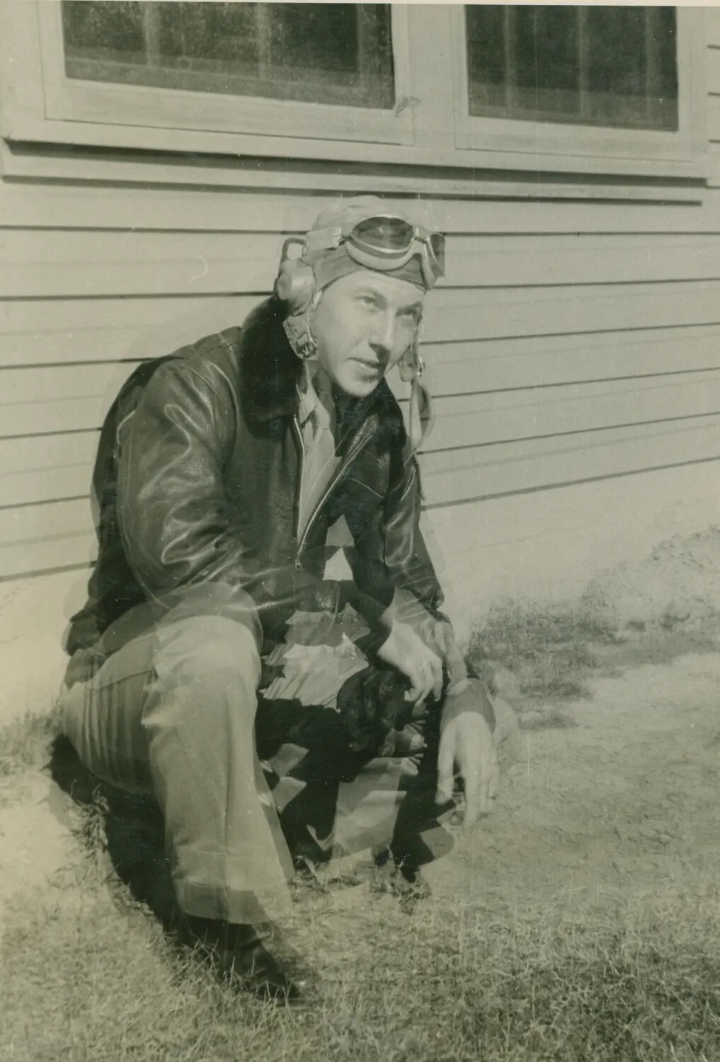 U.S. Army Air Forces Airman in Flight Gear, Portrait Beside Barracks Building (McAleer Album, WWII)