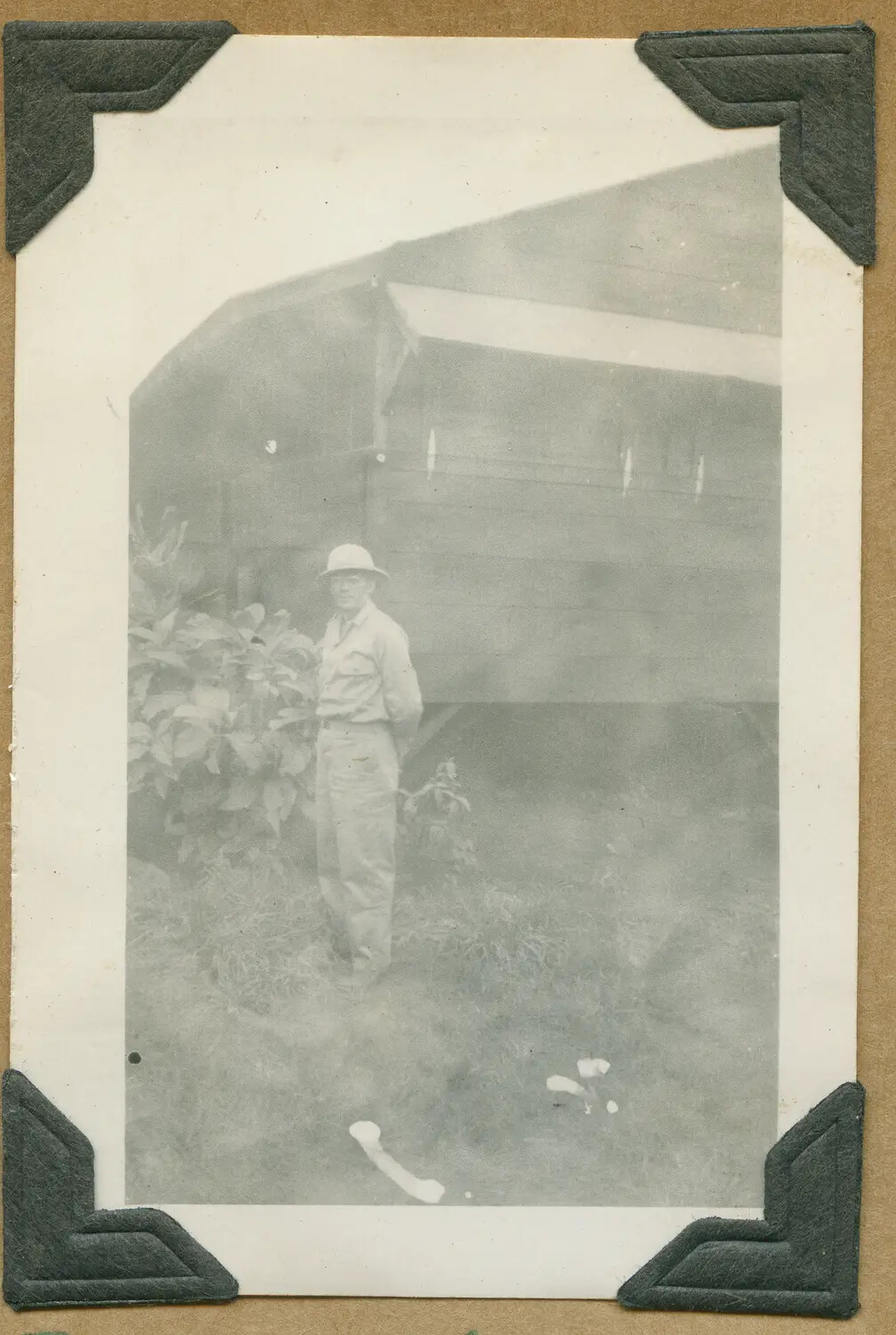 Portrait of Soldier in Sun Helmet Beside Barracks, Schofield Barracks, Oahu, Hawaii Territory, WWII Era