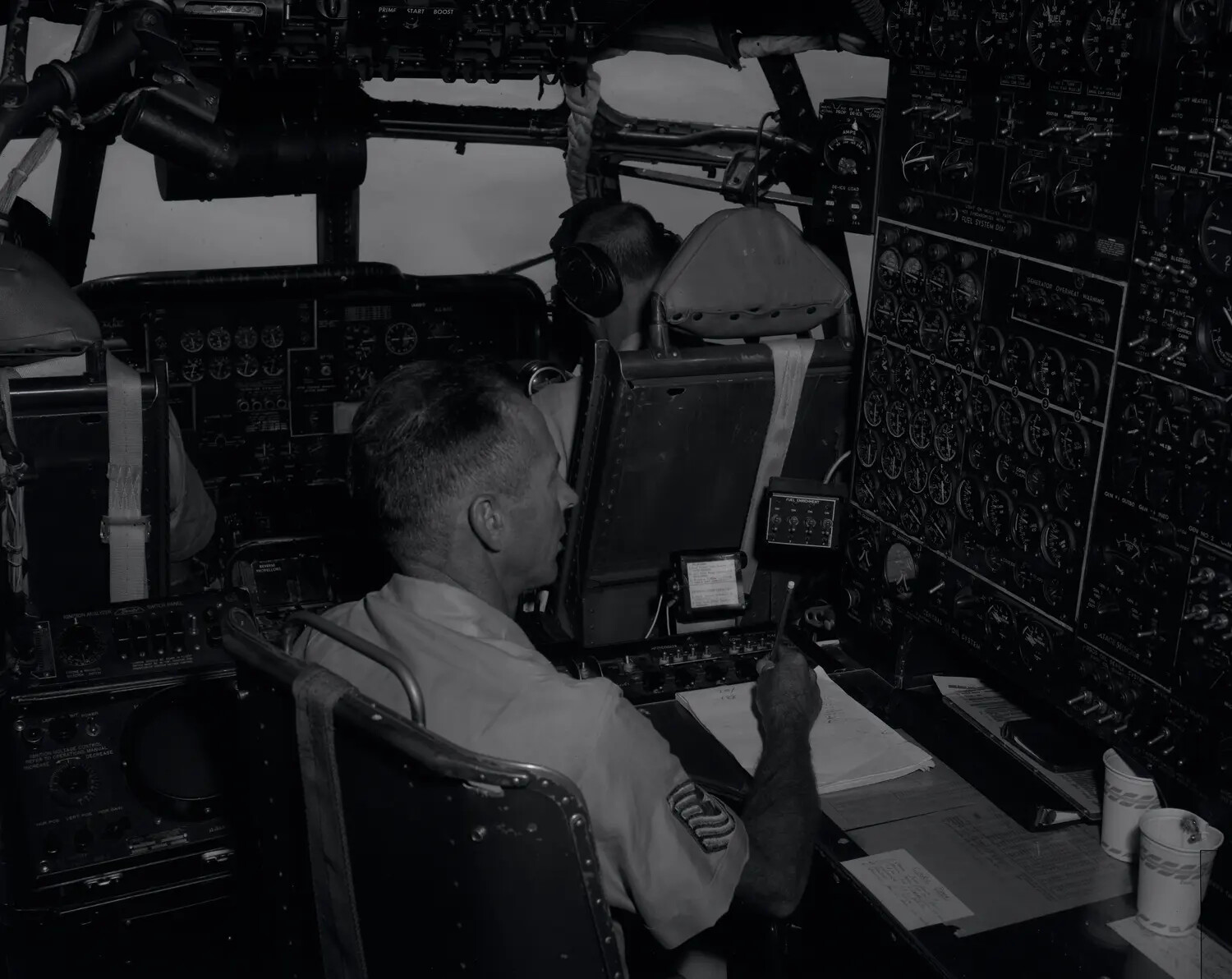 Flight Engineer at Instrument Panel Aboard C-97 Stratofreighter, California Air National Guard