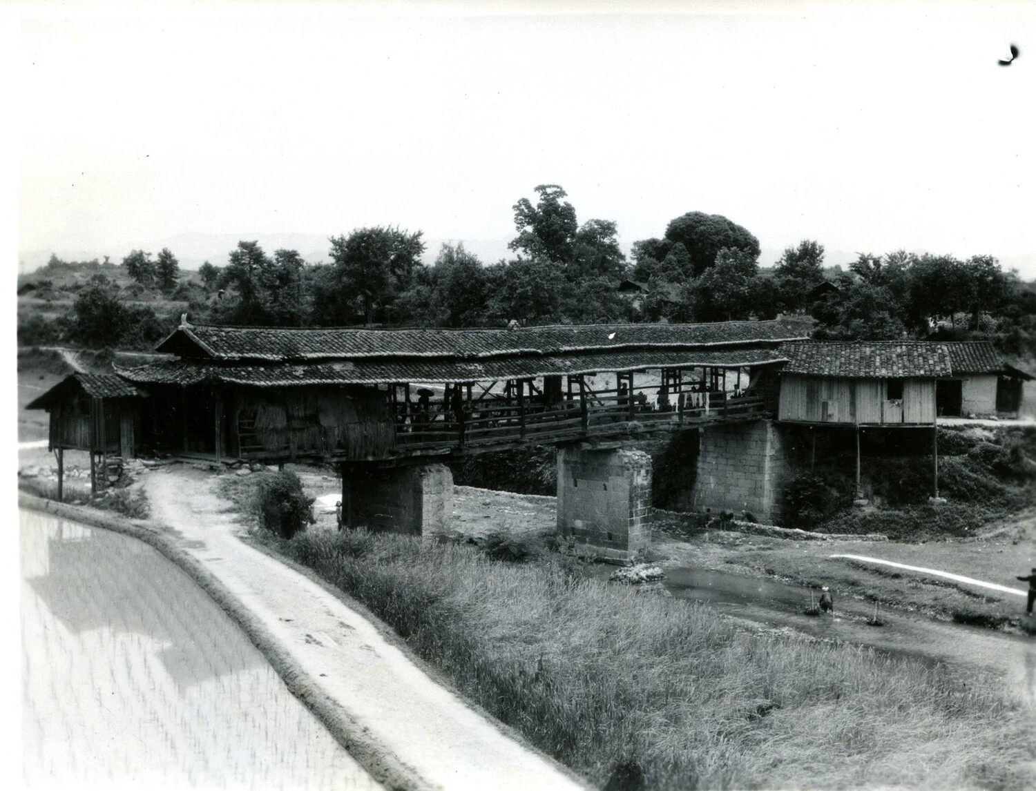 Traditional Covered Bridge Over a Rural Stream, China-Burma-India Theater, World War II Era