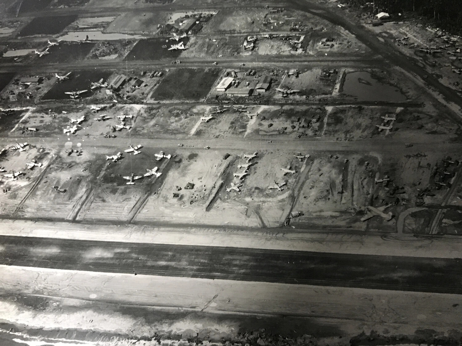 Aerial Reconnaissance Photograph of Japanese Airfield with Dispersed Aircraft, Southwest Pacific Theater