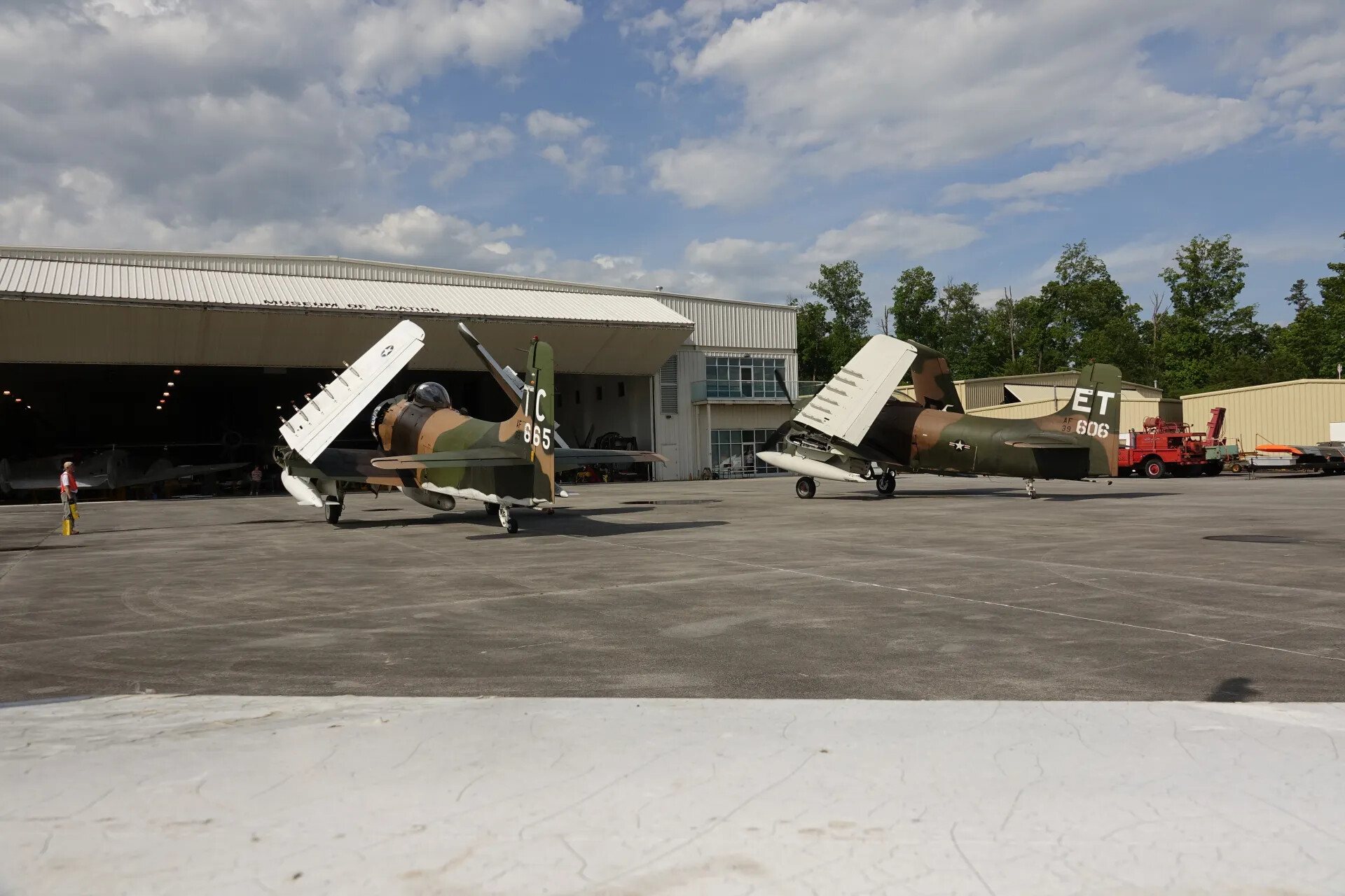 Two Douglas A-1 Skyraiders with Wings Folded on the Museum Ramp, 3-4 May 2019 Event