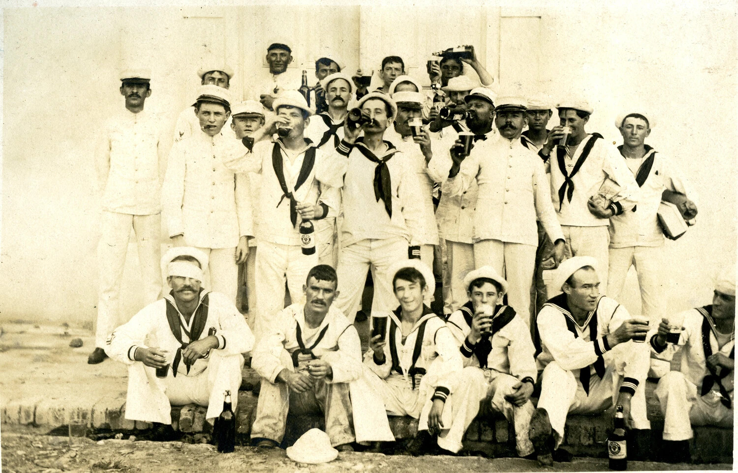 Group Portrait of Sailors on Liberty with Beer Bottles, USS Columbia Album, c. 1898-1908
