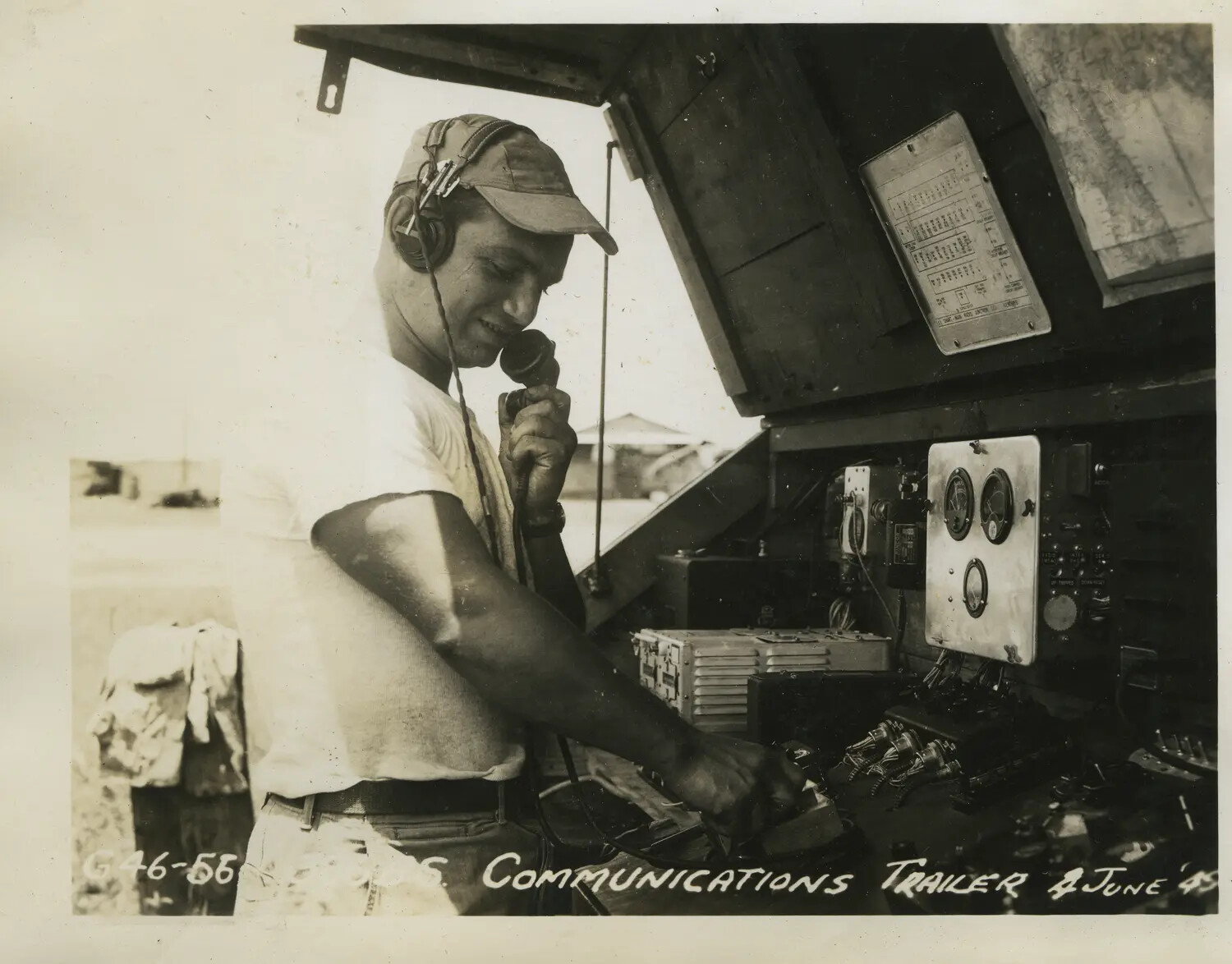 Radio Operator in 312th Bomb Group Communications Trailer, 8 June 1945