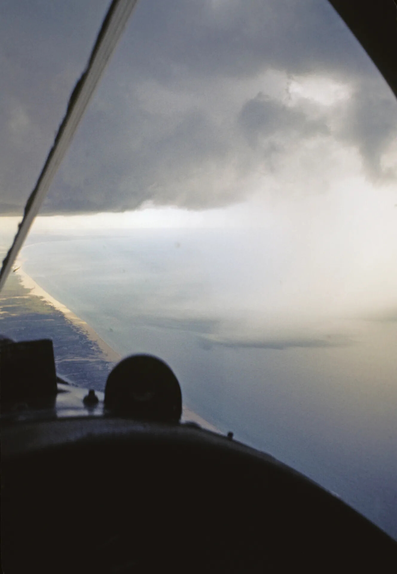 Cockpit View of Storm Cell Over Vietnamese Coastline from A-1 Skyraider, circa 1970