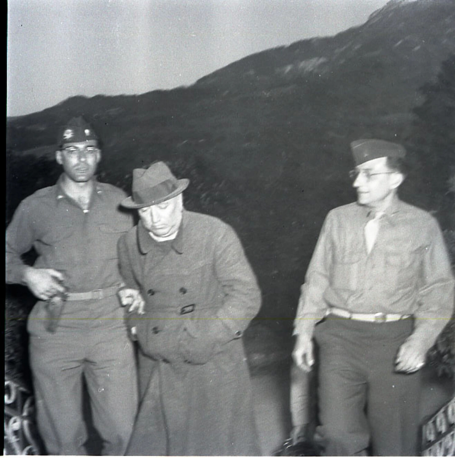 American Soldiers Escorting a Civilian Detainee in the Alps, 101st Airborne Division, May 1945
