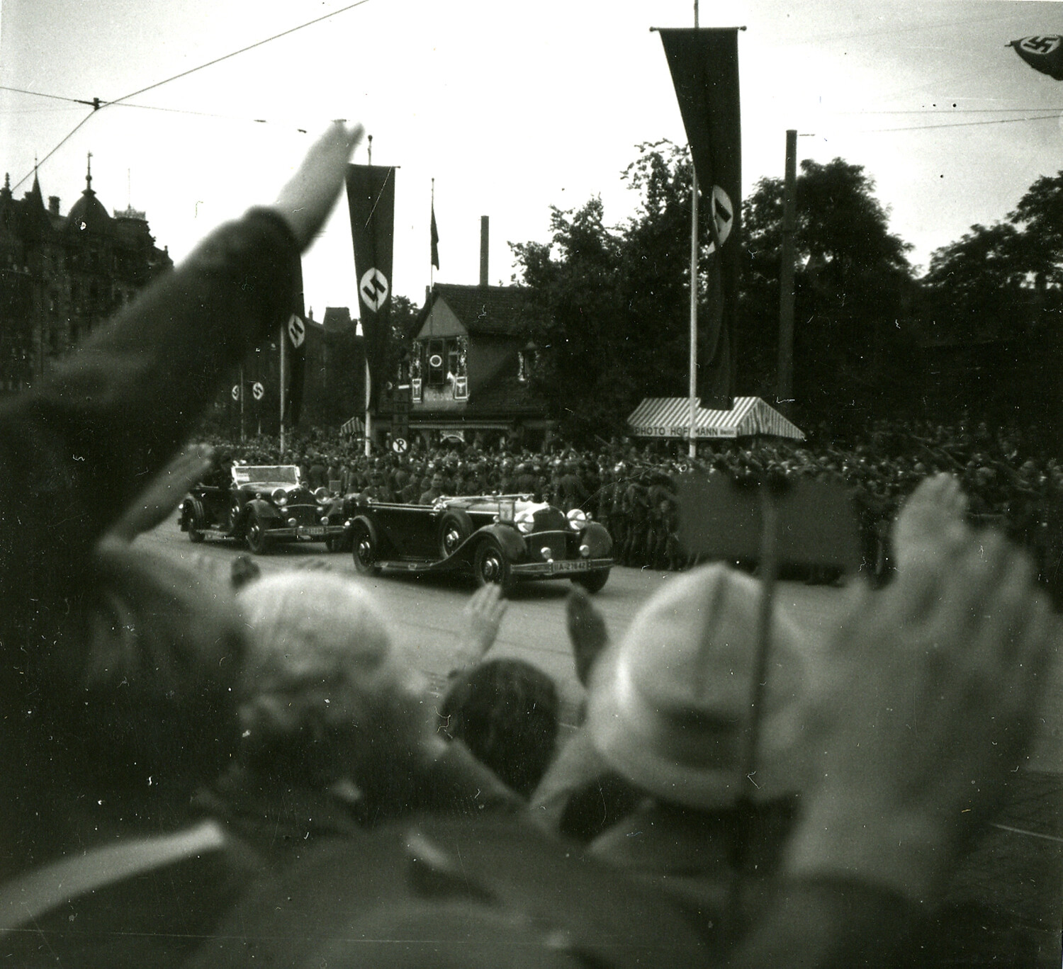 Nazi Party Motorcade Passing Crowds with Swastika Banners, Nuremberg, Germany, c. 1935-1938