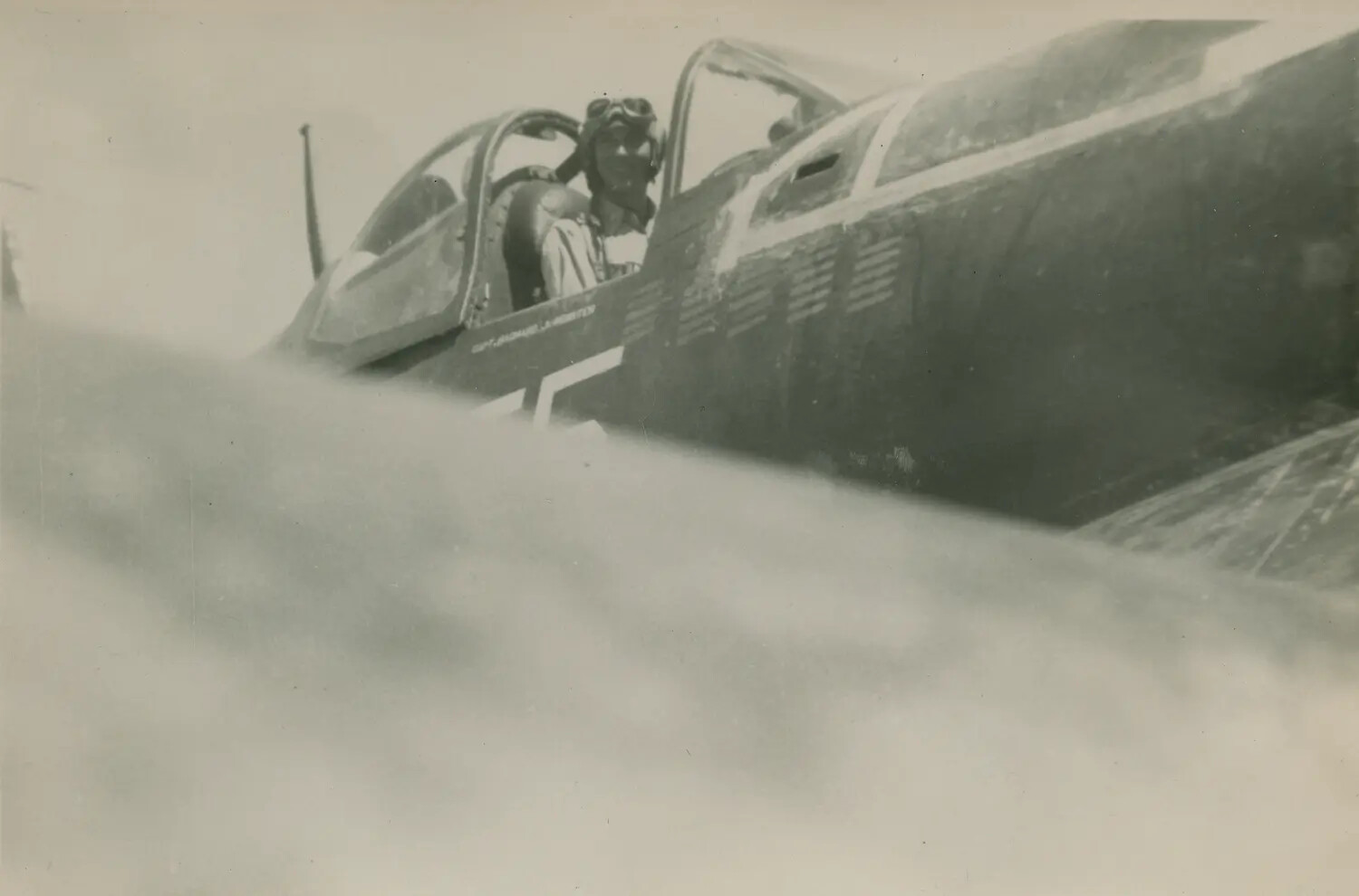 WWII Fighter Pilot in Cockpit with Stenciled Name Below Canopy, Pat McAleer Collection