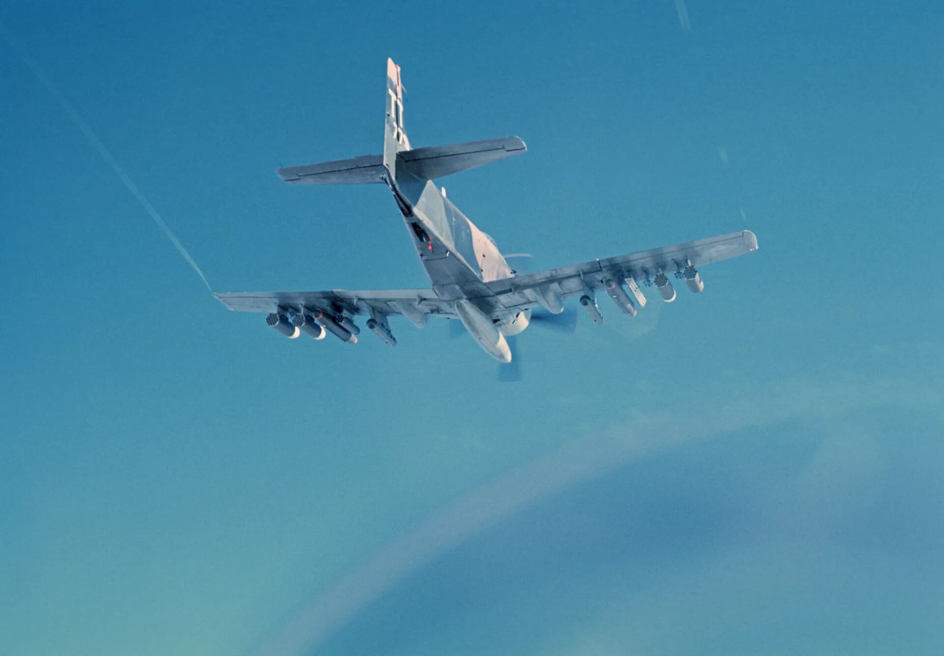 Douglas A-1 Skyraider "TT-779" Banking, Belly and Ordnance View, Southeast Asia, circa January 1970
