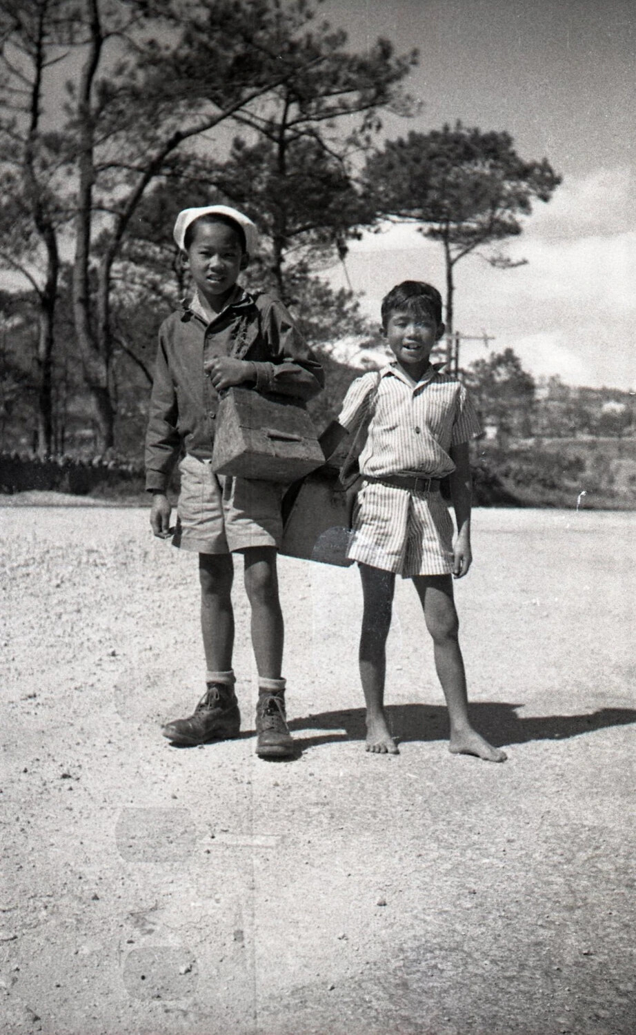 Two Filipino Boys with Wooden Box, Highland Luzon, Philippines, WWII Era