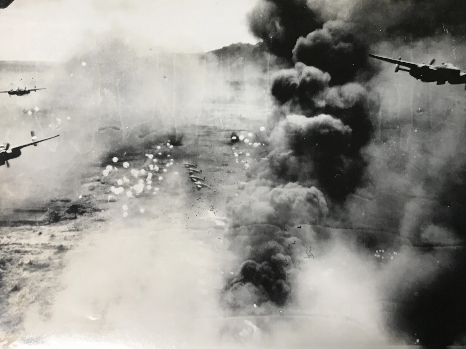 B-25 Mitchell Formation Sweeping Low Over Target Amid Parafrag Bomb Drop and Smoke