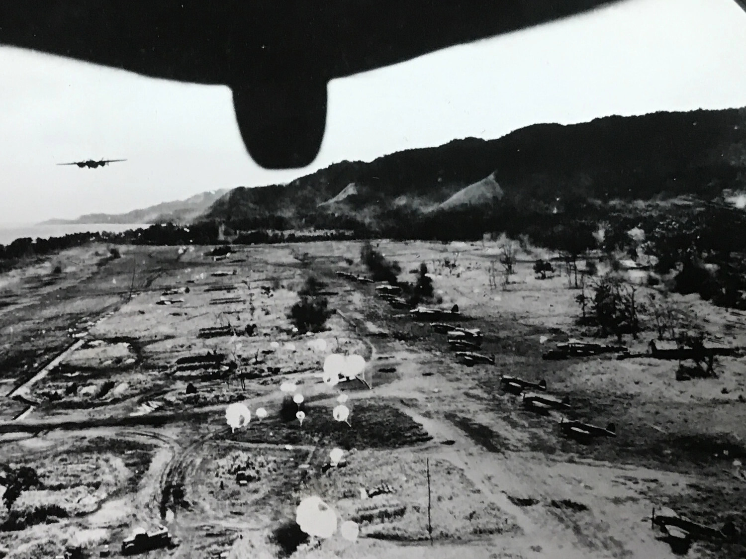 In-Flight View from B-25 Mitchell During Low-Level Strike on New Guinea Airfield