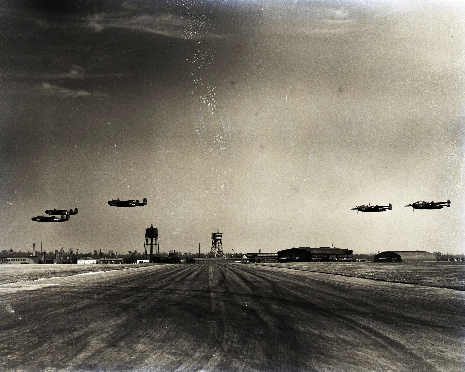 B-25 Mitchell Bombers in Formation Review Over Airfield