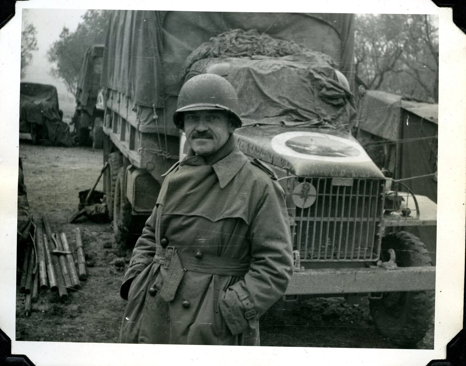 U.S. Army Serviceman Before a Convoy of Cargo Trucks, Jervey Signal Corps Album