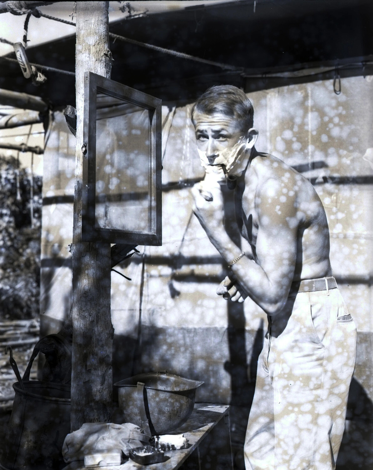 Serviceman Shaving at Field Camp Washstand, WWII China-Burma-India Theater ('Burowan') Collection