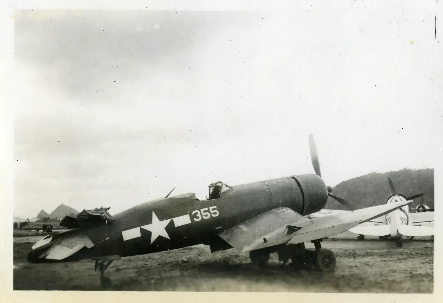 War-Damaged Single-Engine Fighter Aircraft (P-47 Thunderbolt type), Forward Pacific Airfield, WWII