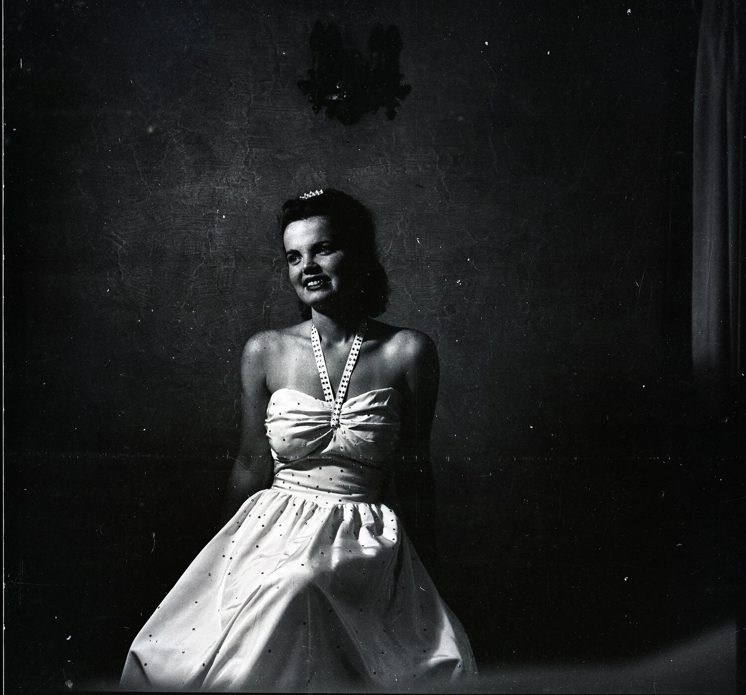 Portrait of a Young Woman in Tiara and Rhinestone Evening Gown