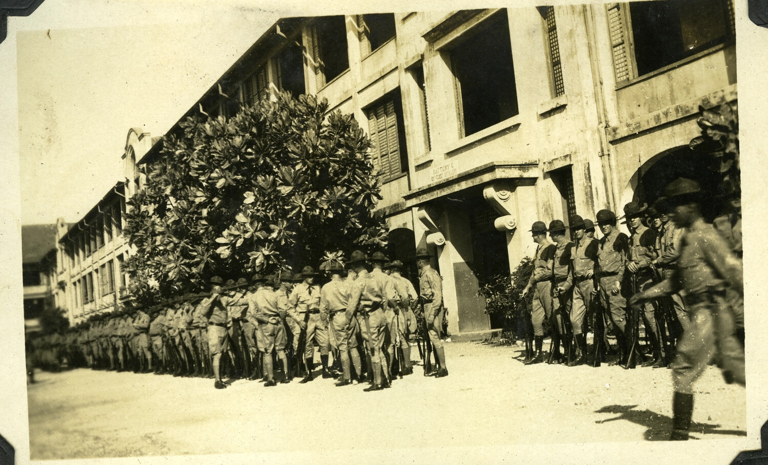 Coast Artillery Battery Formation Outside Barracks Building, 'Battery C' Signage Visible, Manila Bay Area, Philippines