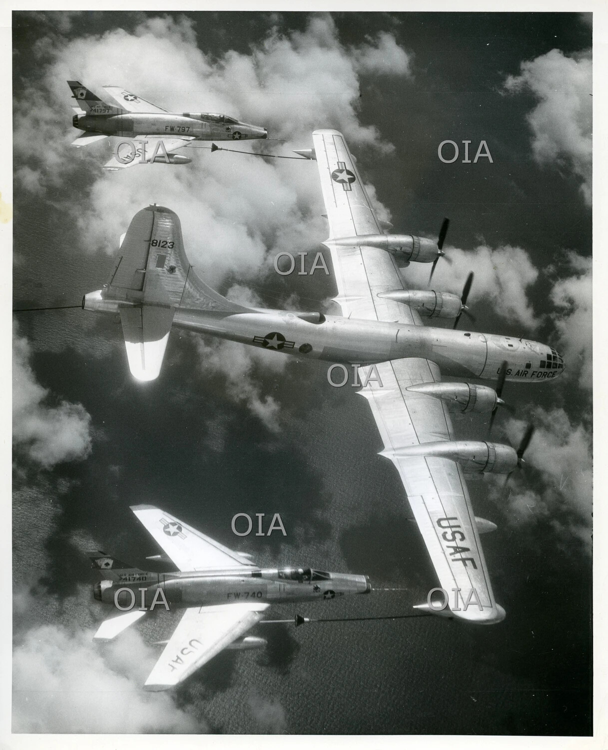 Boeing KB-50 Tanker (Serial 8123) Refueling Two North American F-100 Super Sabres (FW-797 and FW-740) in Flight