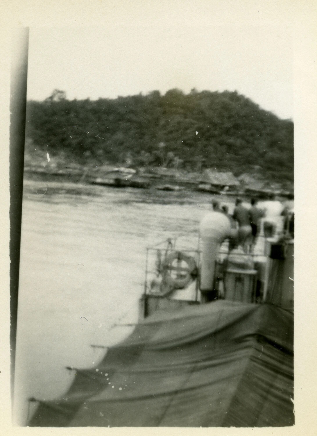 Sailors Observing a Native Village from Shipboard, Pacific Theater, WWII
