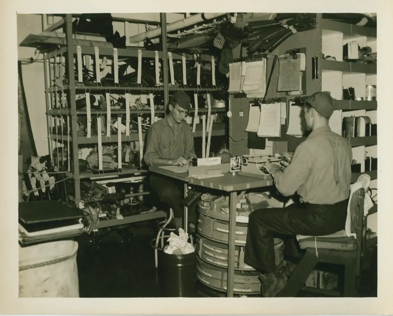 Sailors at Work in Shipboard Repair Shop, USS Petrof Bay (CVE-80)