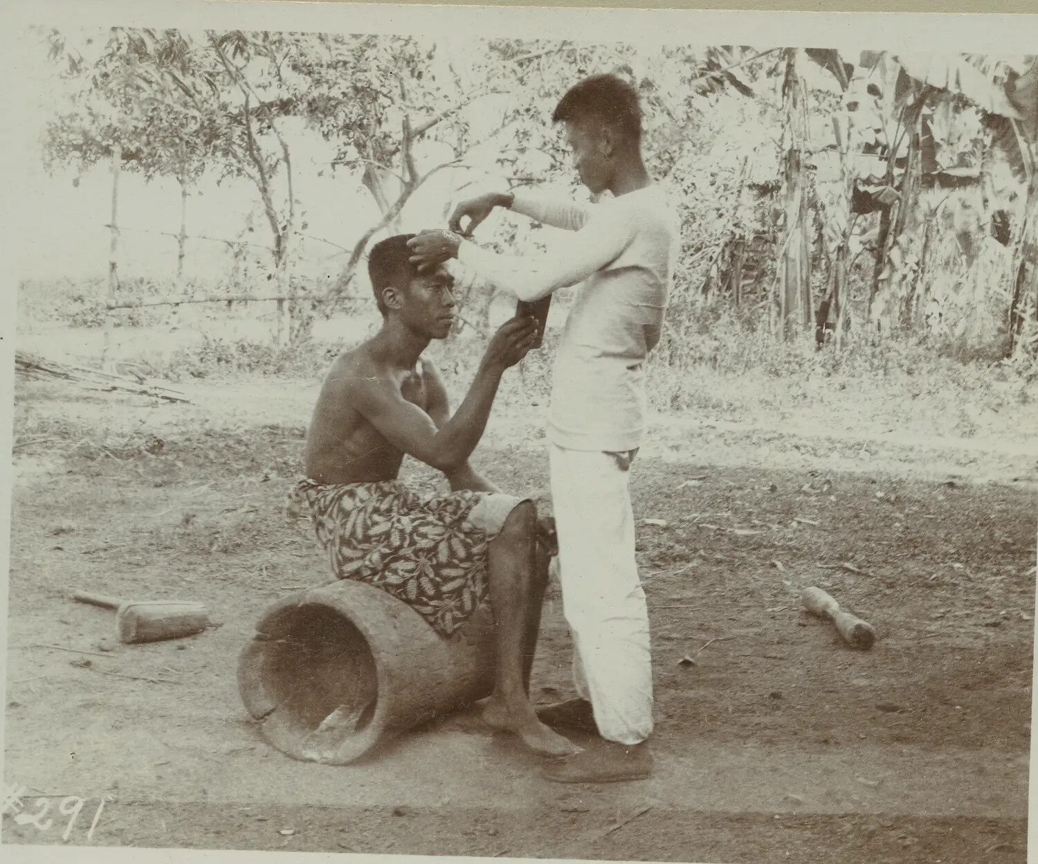 Genre Photograph: Barbering Scene, Rural Philippines, c. 1890s-1900s