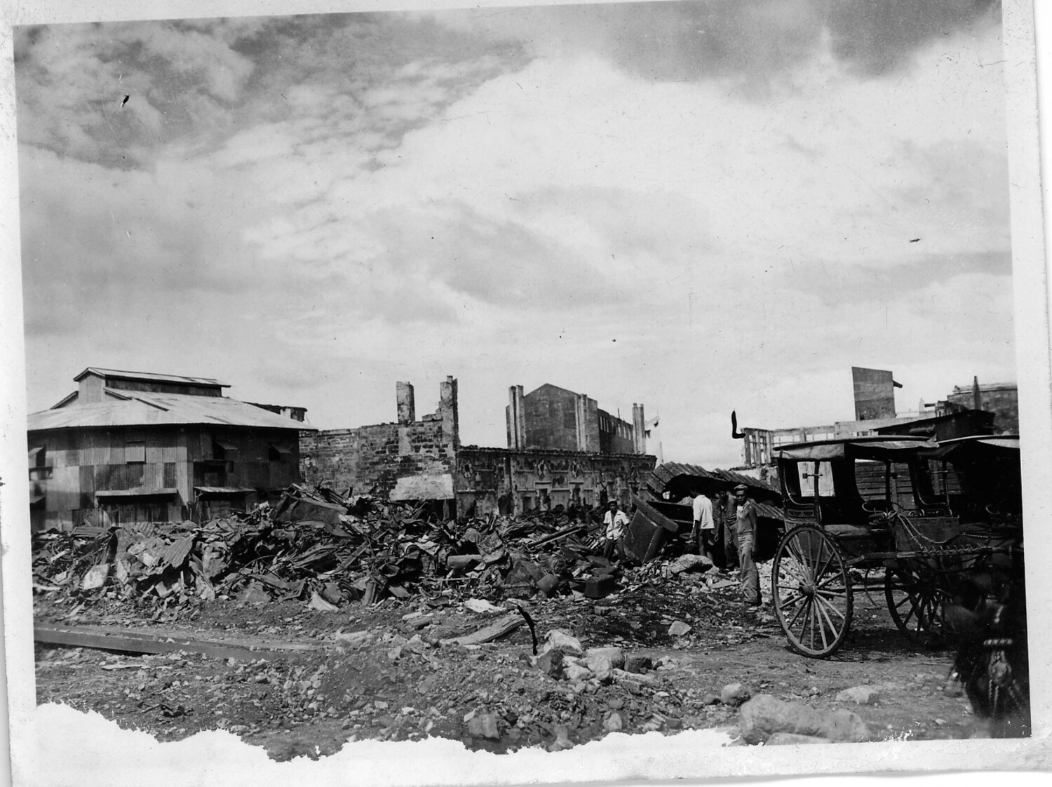 Rubble-Strewn Street with Horse-Drawn Calesa and Filipino Residents, Manila, Philippines, 1945