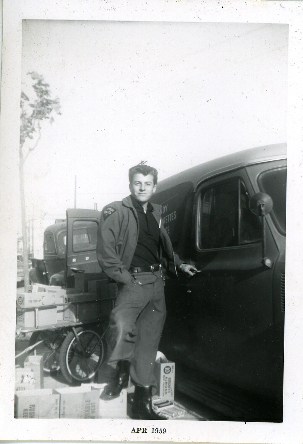 Serviceman Beside Mobile Post Exchange Canteen Truck, April 1959