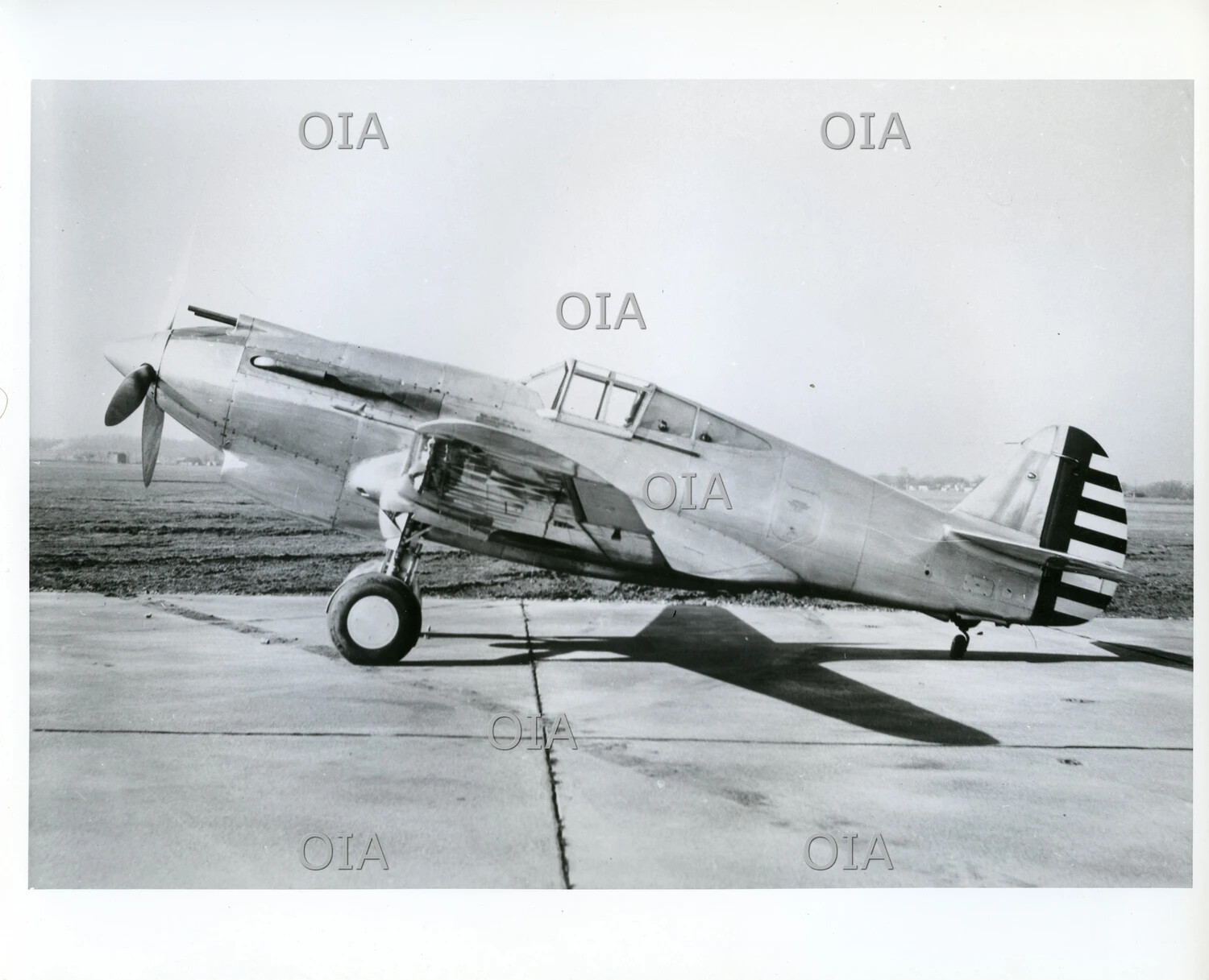 Curtiss XP-40 Prototype Fighter, Right Profile View on Airfield Ramp