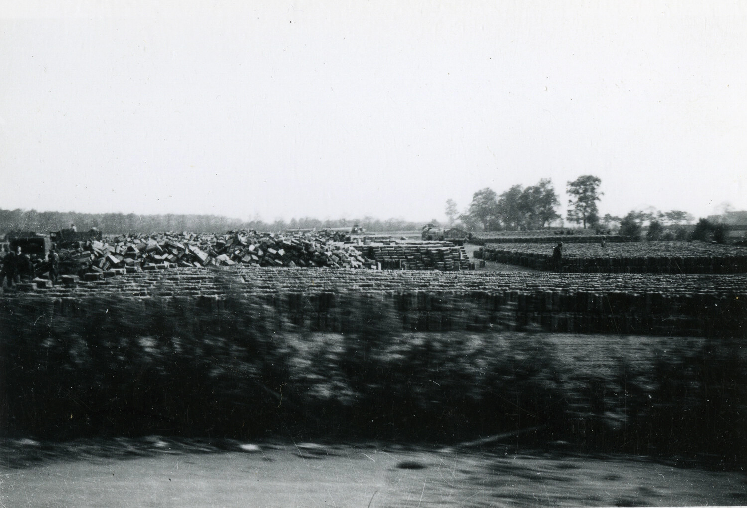 Captured German Ammunition/Supply Dump Viewed from Passing Vehicle
