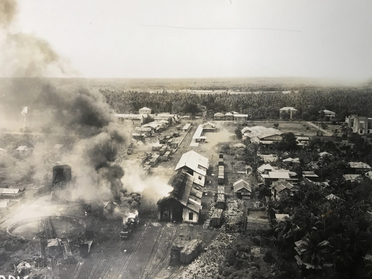 Railway Yard Fire and Turntable Under Attack, Philippines - 312th Bomb Group Strike Photograph (Sequence Frame)