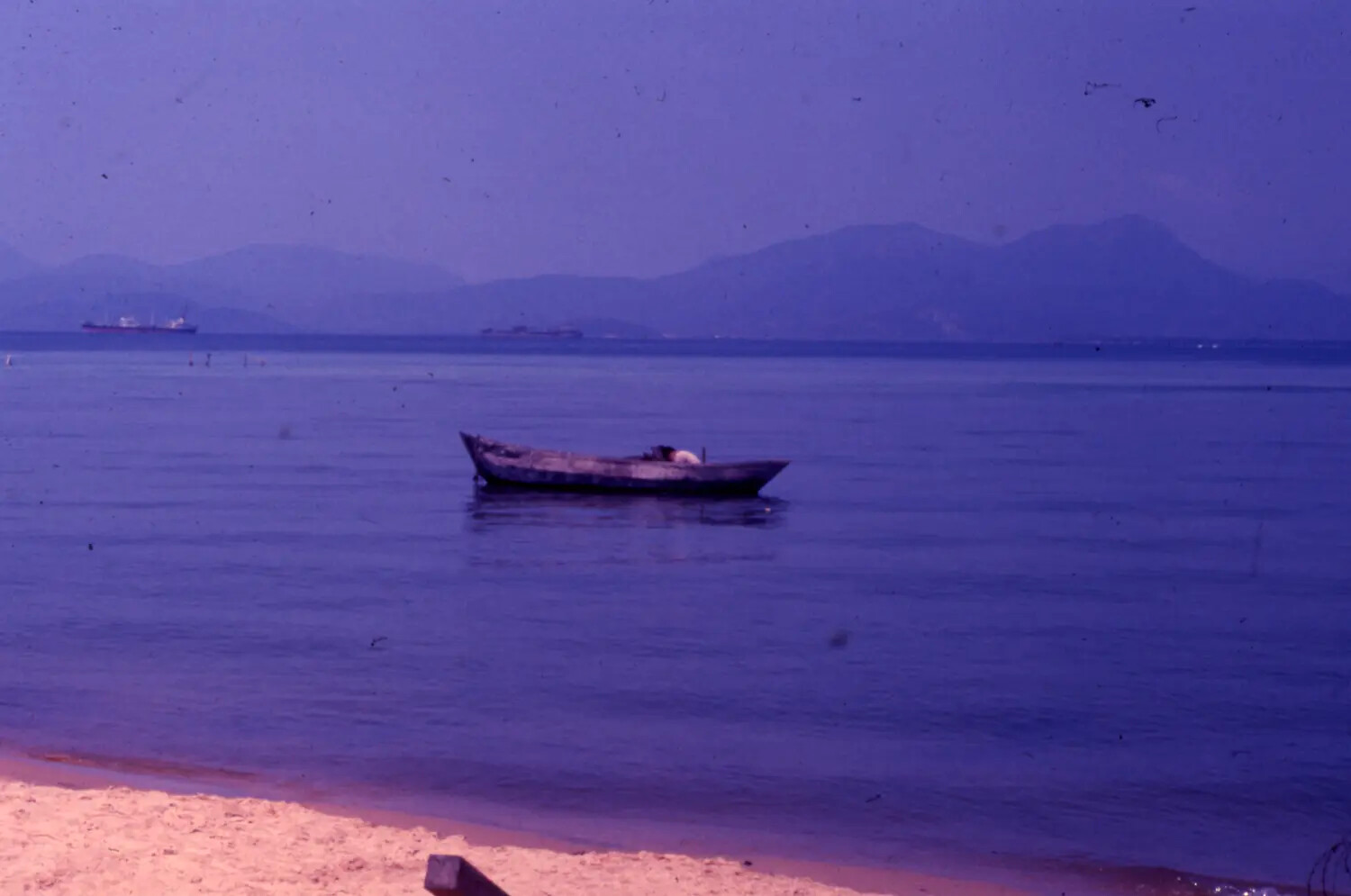 Small Fishing Boat and Anchored Ships, Cam Ranh Bay Harbor, Vietnam
