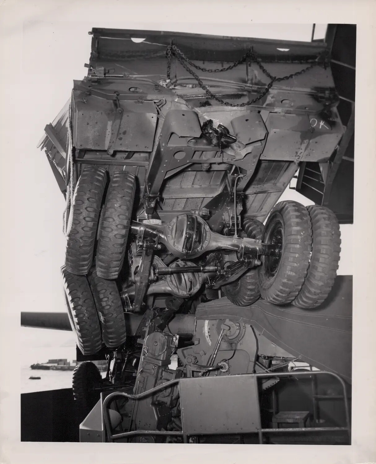 Military Cargo Truck Hoisted Aboard USS Petrof Bay (CVE-80), 21 August 1945