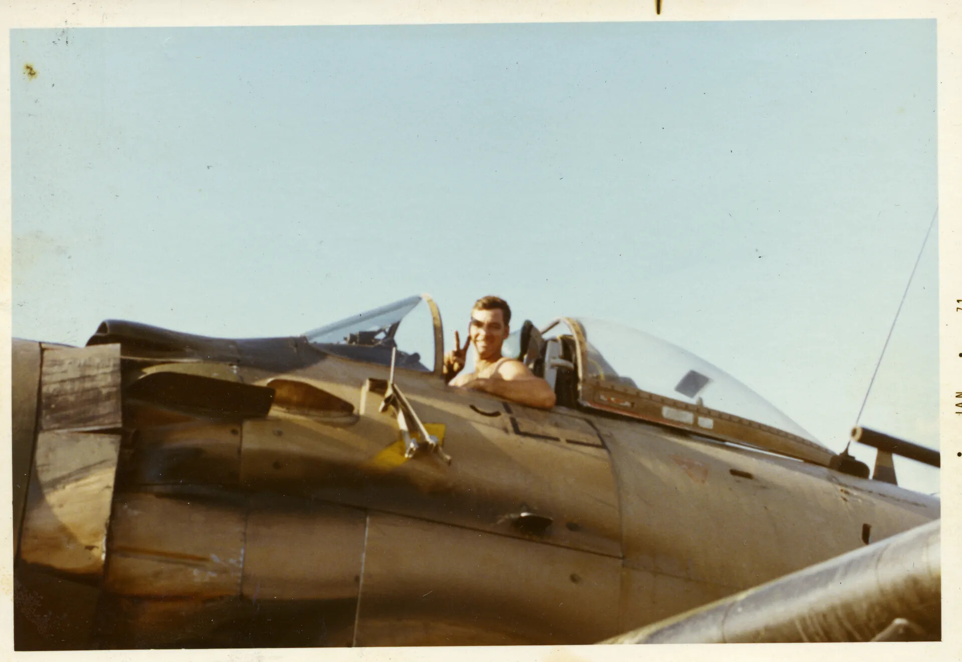 USAF A-1 Skyraider Pilot in Cockpit, Peace Sign, NKP RTAFB, January 1971