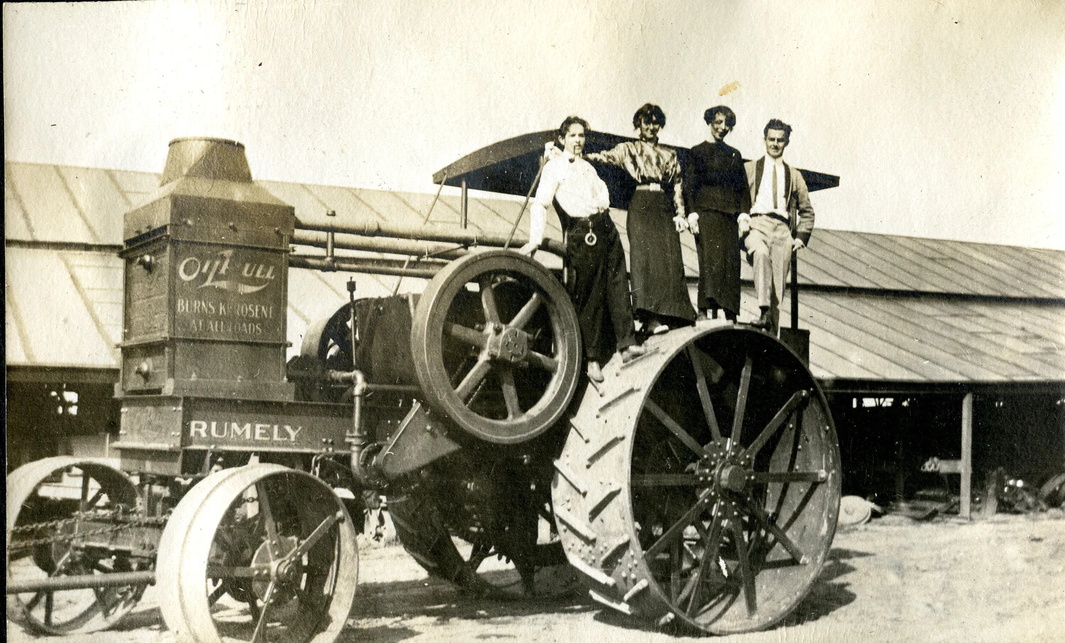 Family Posed on a Rumely 'OilPull' Kerosene Tractor, Farm Setting, c. 1917-1919