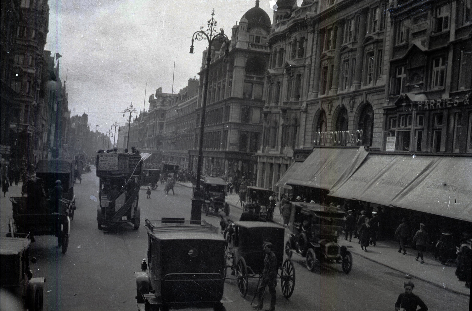Busy London Street Scene near John Pound & Co., WWI Era