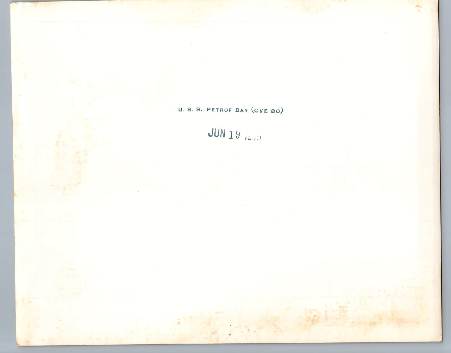 Verso of Photograph with USS Petrof Bay (CVE-80) Identification Stamp