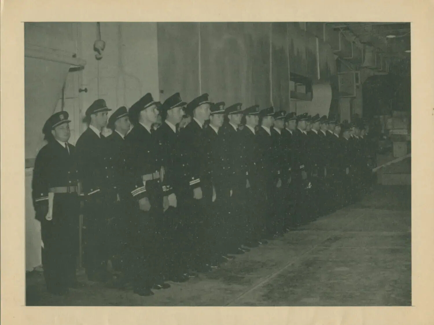 Line of Navy Officers in Dress Blues at Attention, USS Petrof Bay (CVE-80), WWII