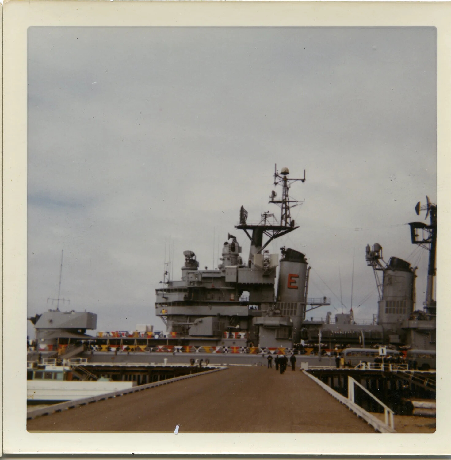 USS Saint Paul (CA-73) Superstructure and Battle Efficiency 'E' Award Marking, Viewed from Pier, circa 1970