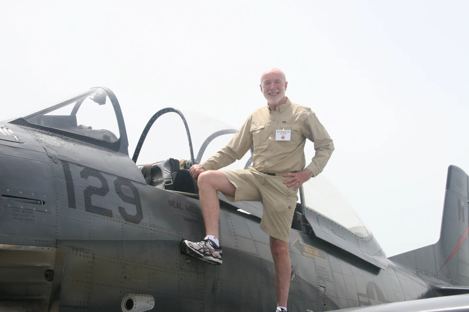 Attendee Posing with A-1 Skyraider '129,' Tailwind Reunion Event 2016