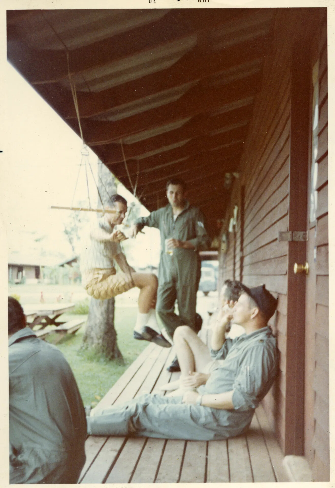 Airmen Relaxing on Barracks Porch, Nakhon Phanom RTAFB, Vietnam War Era