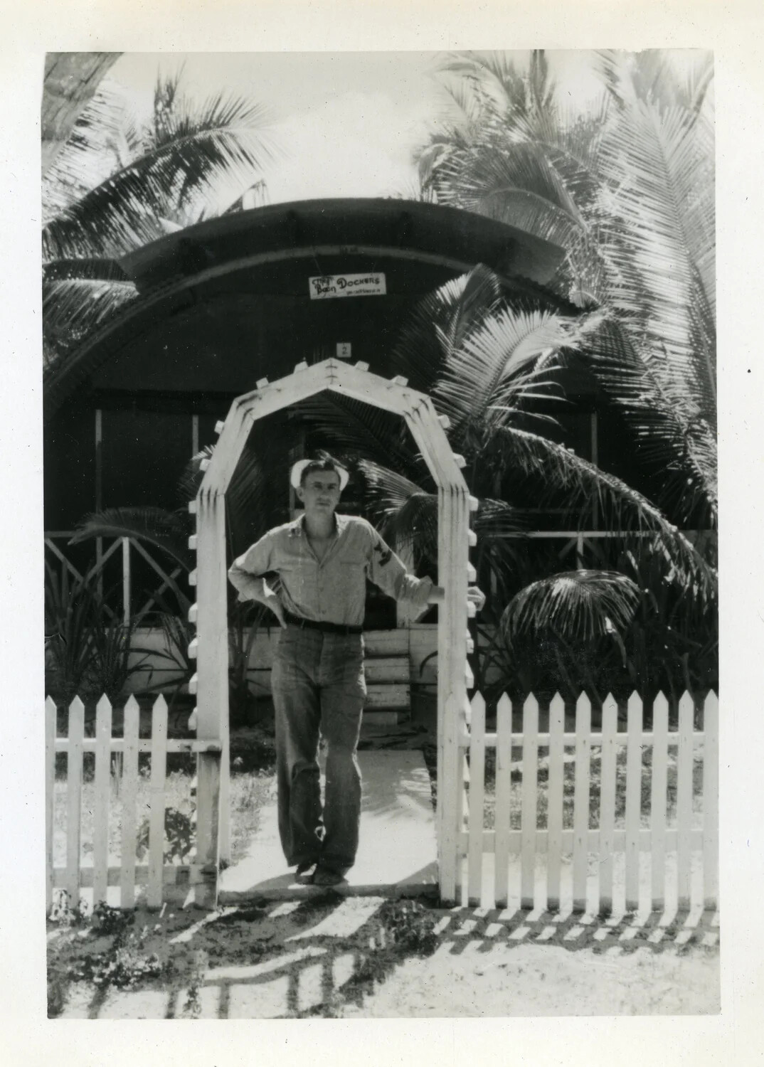 Sailor at Garden Archway, Quonset Hut Recreation Building, NAS Agana, Guam