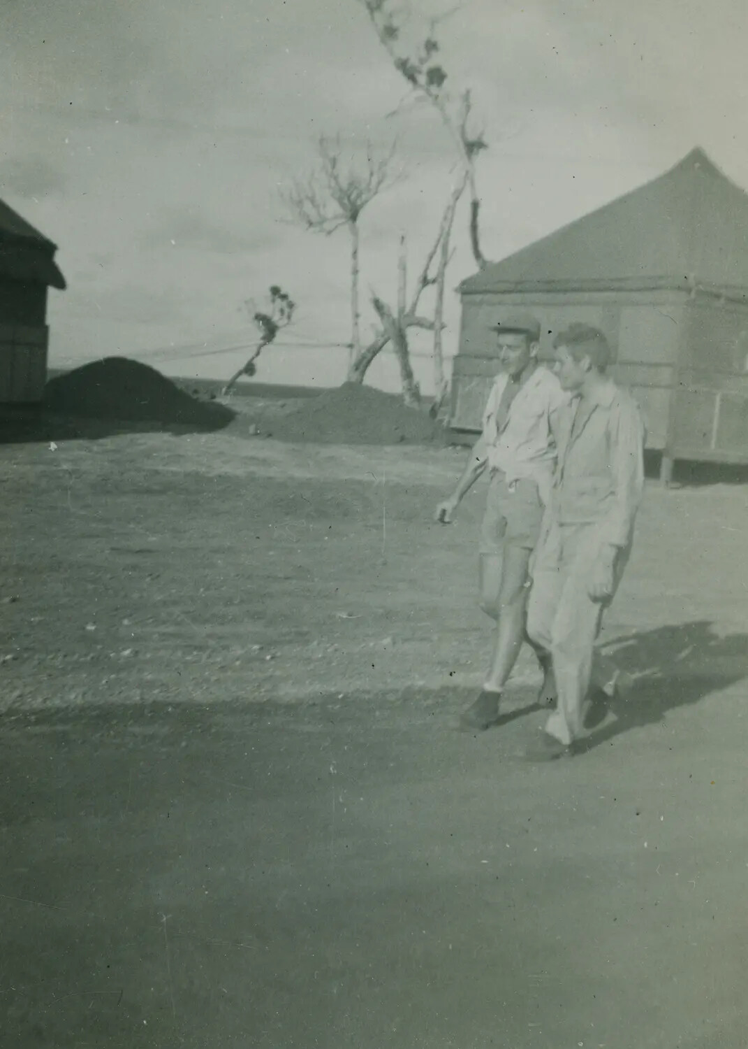 Two Servicemen Walking Through Camp, McAleer Collection