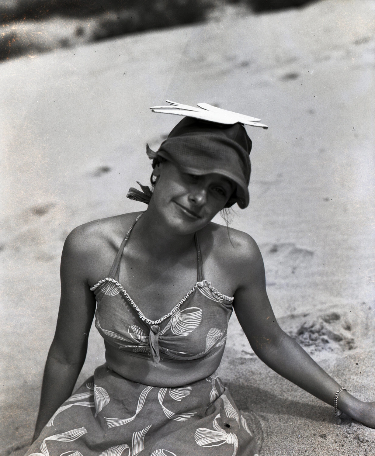 Portrait of a Young Woman in Floral Swimsuit on the Beach, 1940s